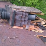 Chimney toppled with 3 chimney caps with wood shake on chimney and asphalt roof